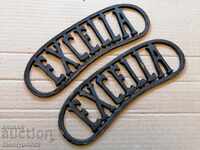 EXCELLA figural cast iron emblem from a sewing machine
