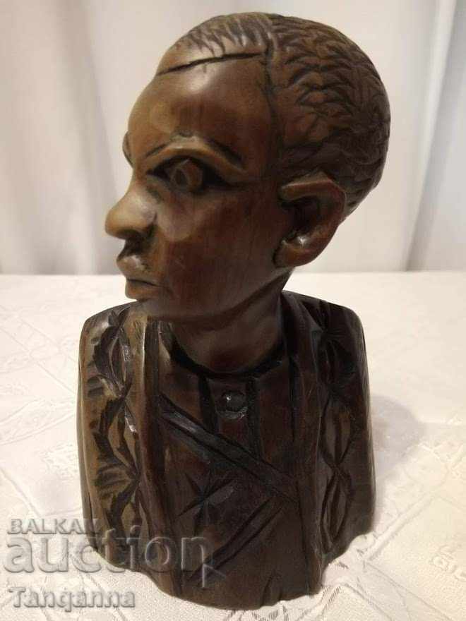 African figurine bust carving