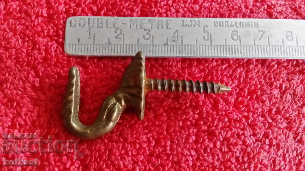 Old metal bronze brass hanger