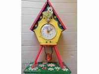 Children's tin toy clock winding with a key