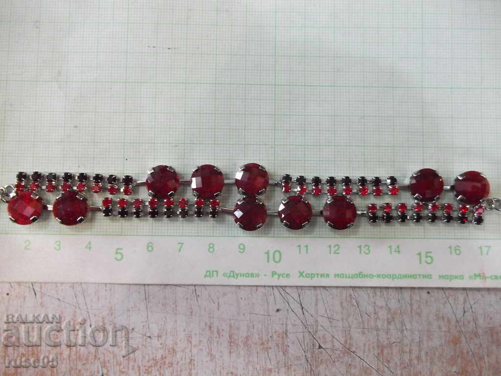 Hand chain with red stones imitation jewelry with price 10.00 BGN | € 5.11 Hand chain with red stones imitation jewelry with price 10.00 BGN | € 5.11