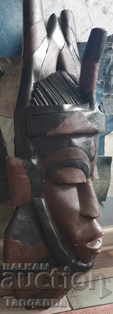 Auction African leather mask Auction African leather mask