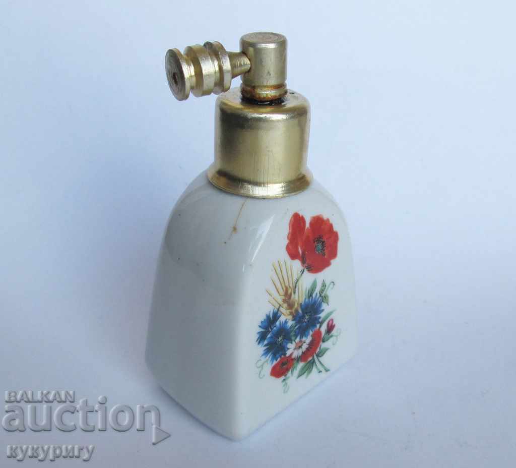 Auction  An old porcelain perfume bottle
