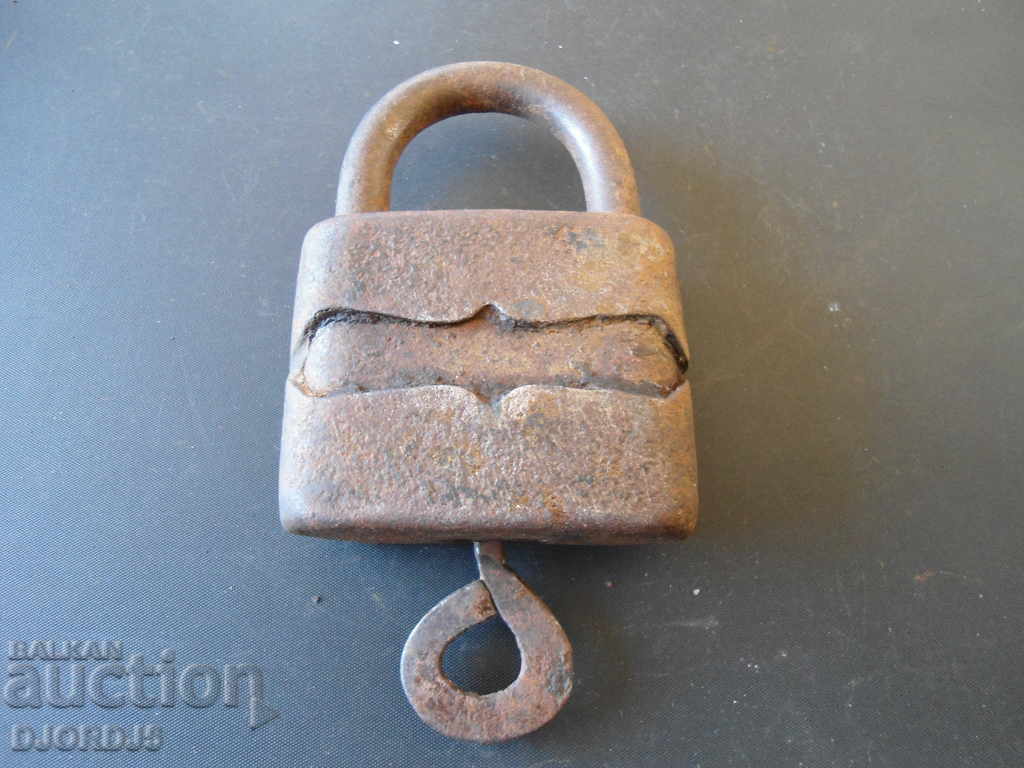 Old padlock with key, working