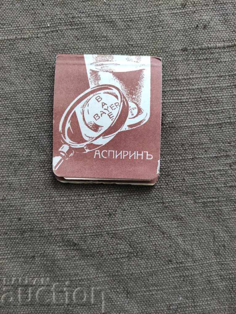 A small notebook with a calendar Aspirin Bayer