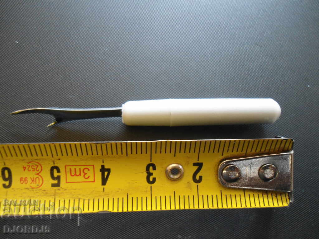 Auction  Old tailoring tool