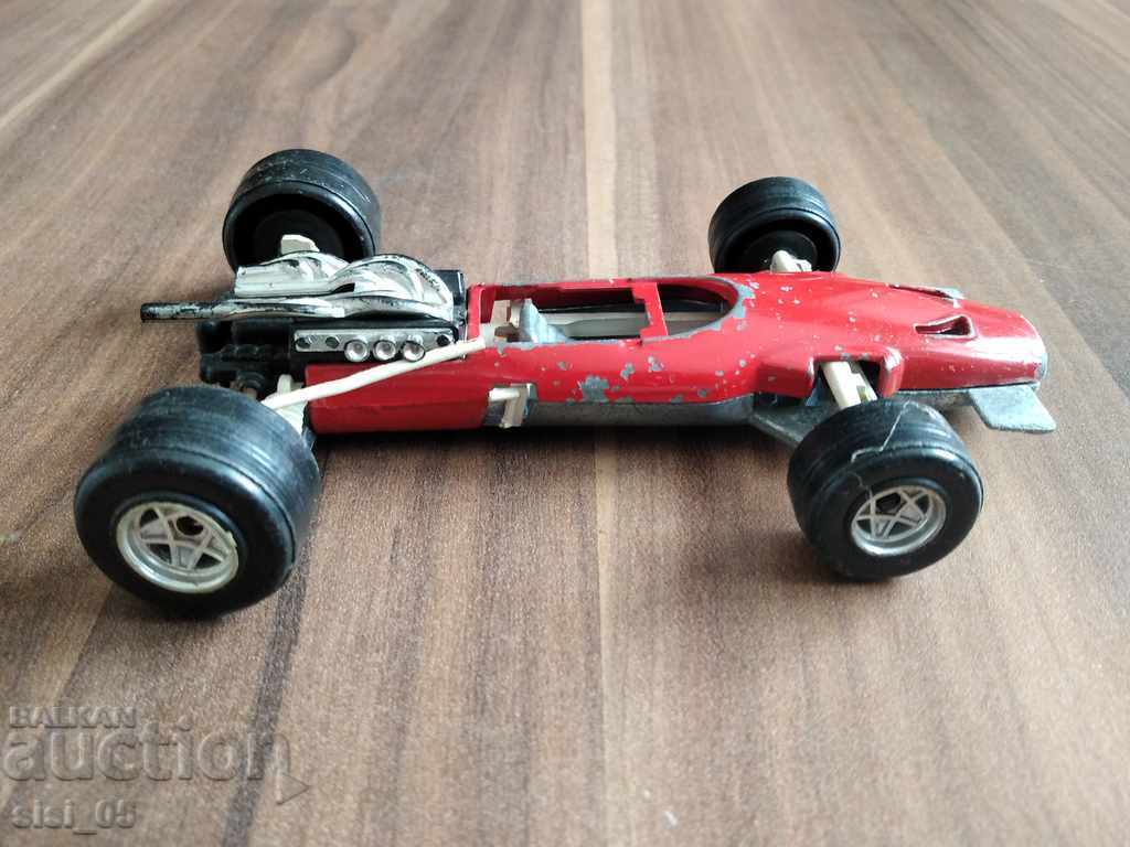 Auction Old metal trolley, car POLITOYS BRM 136 F.1 Auction Old metal trolley, car POLITOYS BRM 136 F.1