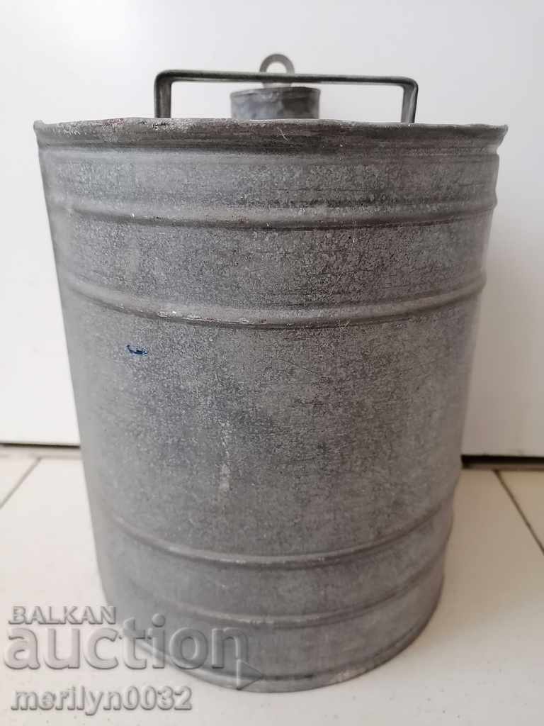 Old galvanized metal tube, bucket, container