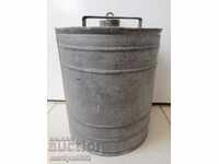 Old metal galvanized tube, bucket, container