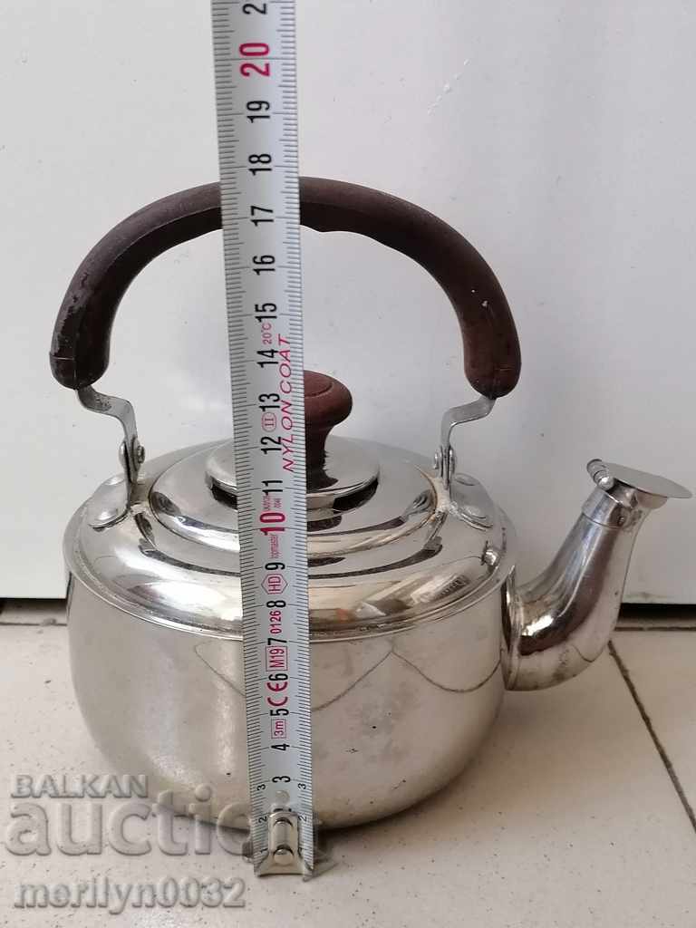 Old teapot with bakelite handle
