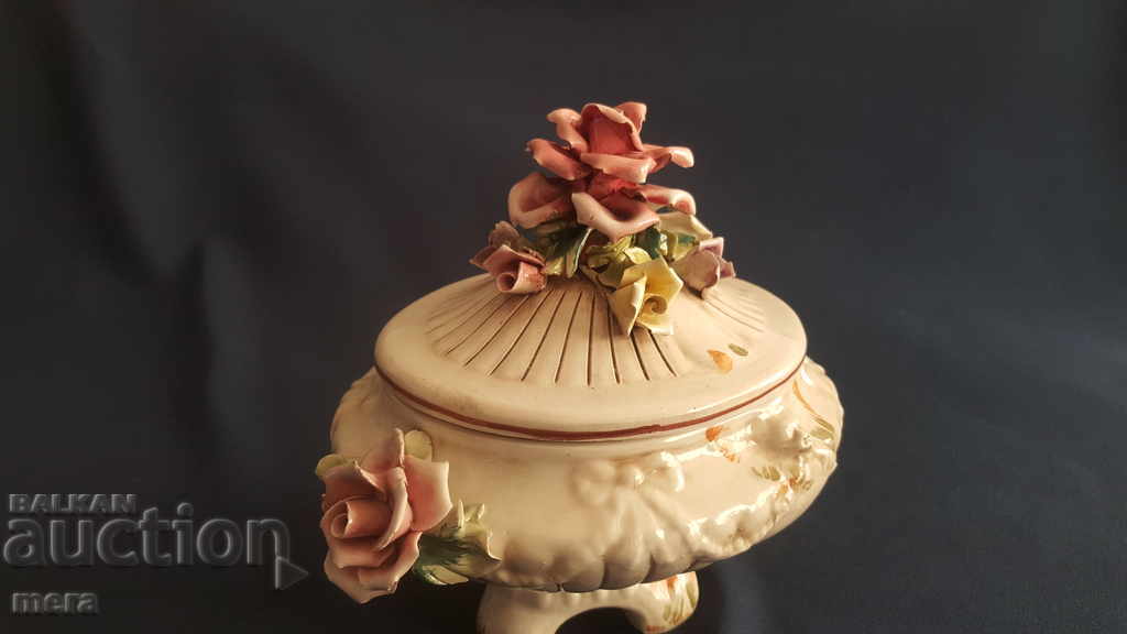 Old porcelain vessel with exquisite floral motifs with price 110.00 BGN | € 56.24 Old porcelain vessel with exquisite floral motifs with price 110.00 BGN | € 56.24