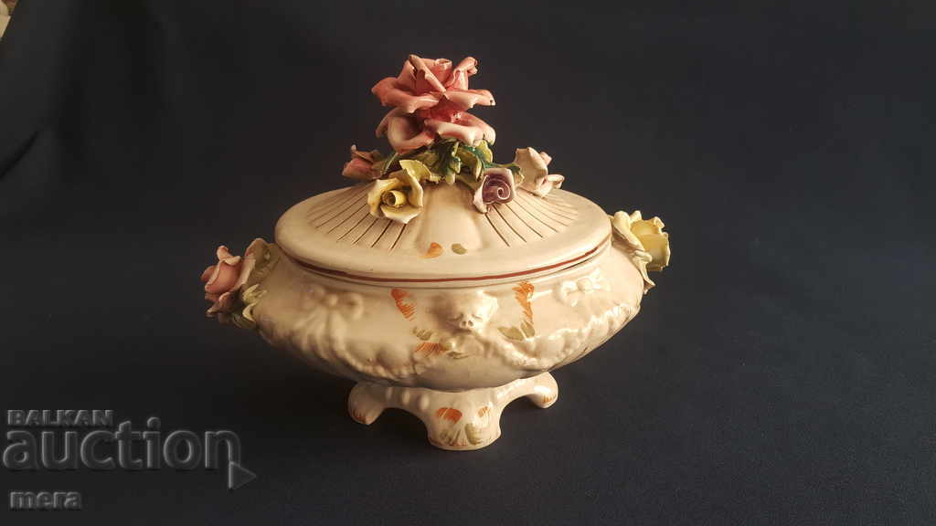 Old porcelain vessel with exquisite floral motifs