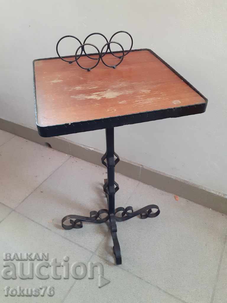 Old wrought iron telephone table
