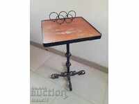 Old wrought iron telephone table