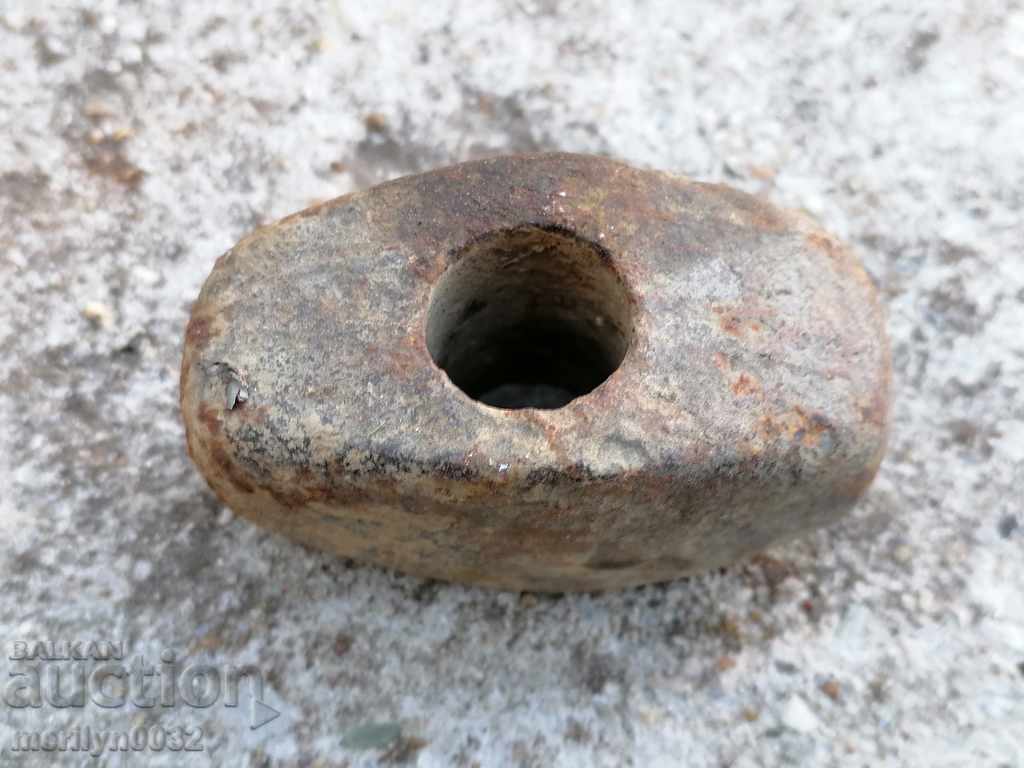 Delivery of An old stone hammer, a tool, a kink Delivery of An old stone hammer, a tool, a kink