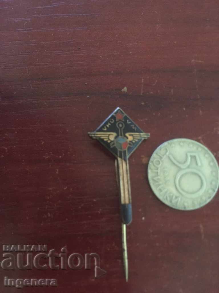 Auction  OLD ENAMEL BADGE