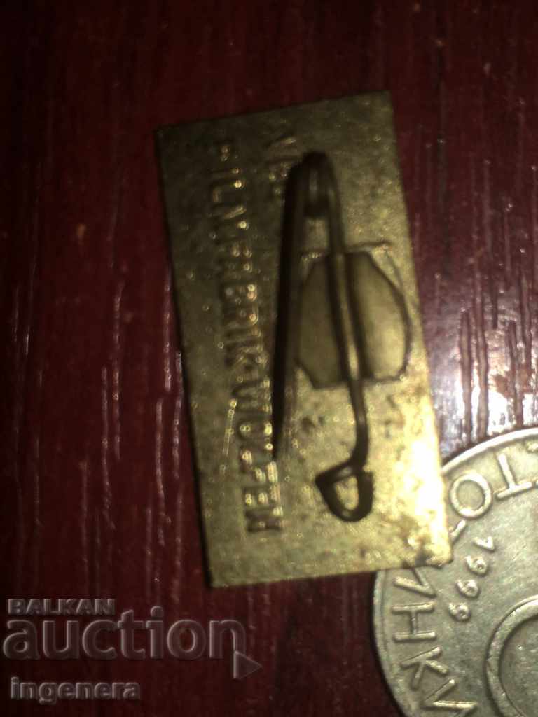 Delivery of ENAMELED BADGE