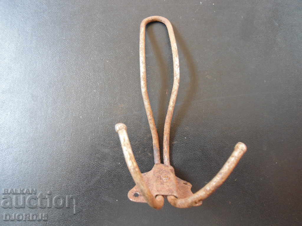 Auction  An old metal hanger