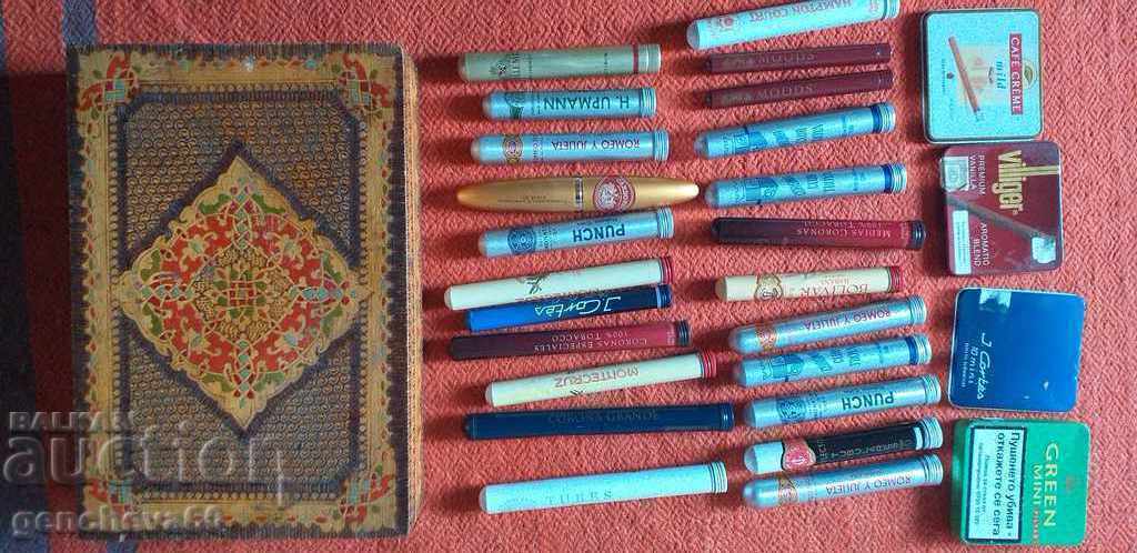 Collection of cigars in an old wooden, pyrography box Collection of cigars in an old wooden, pyrography box