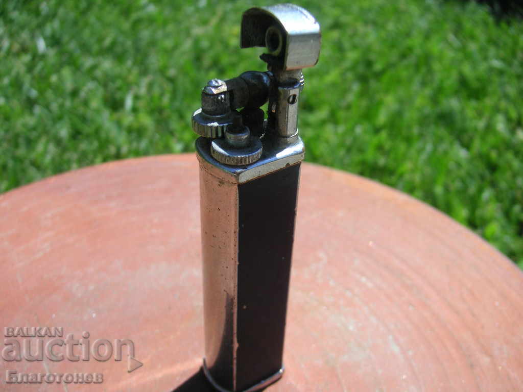 Auction  An old lighter