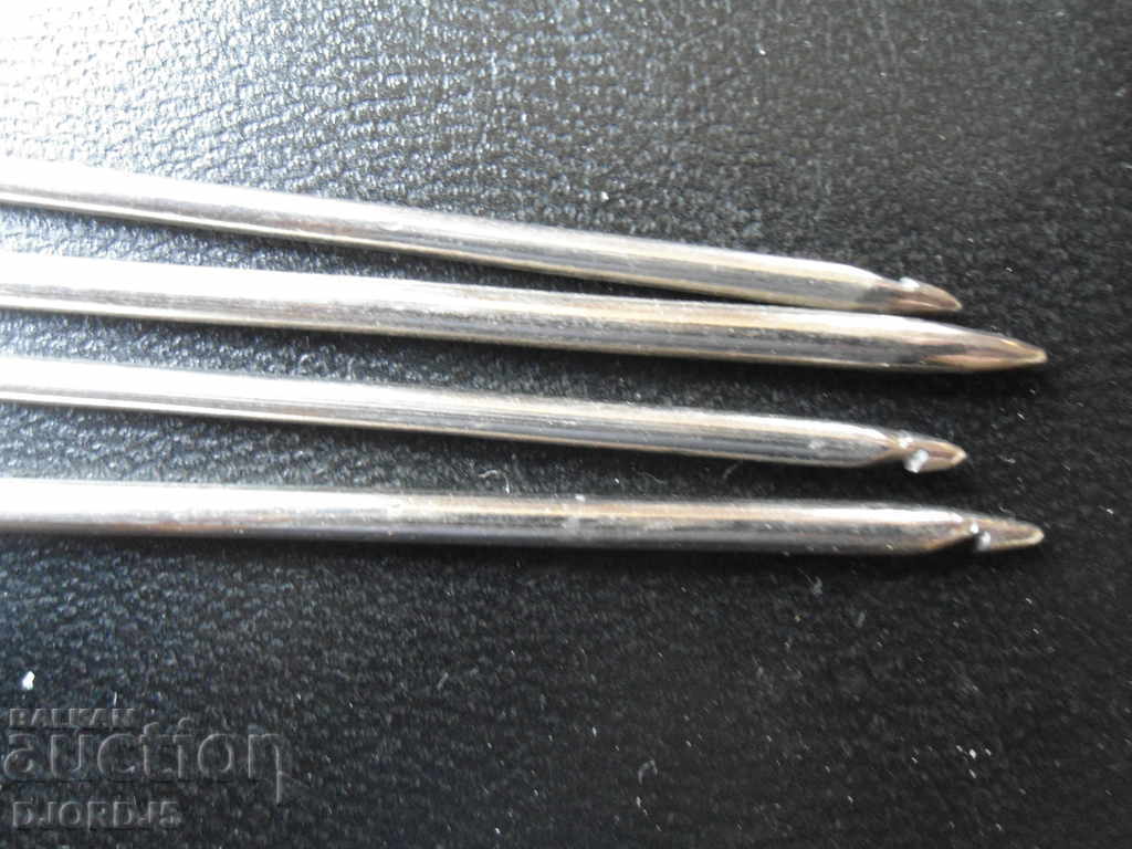 Auction  Old metal knitting needles