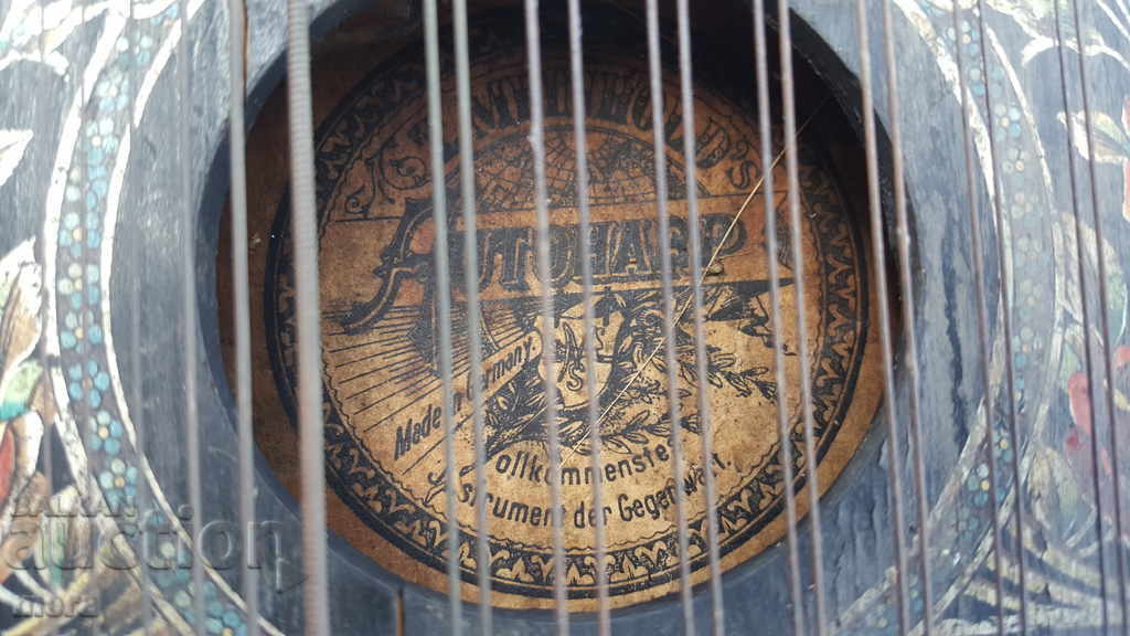 Auction  Ancient stringed musical instrument