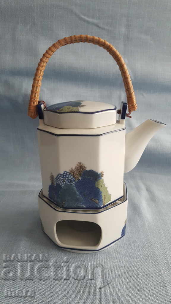 Porcelain teapot complete with porcelain heater