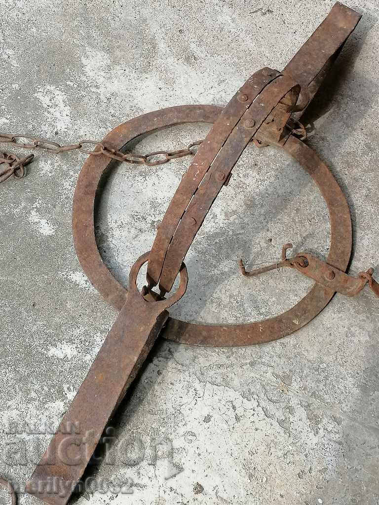 Auction Old hand forged trap with wrought iron spikes Auction Old hand forged trap with wrought iron spikes