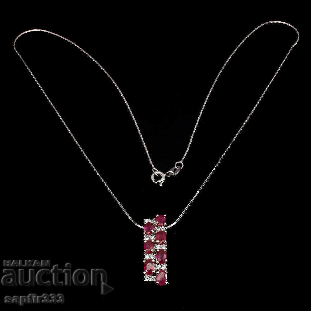 Auction STYLISH DESIGNER MEDALLION OF RUBY AND ZIRCONI Auction STYLISH DESIGNER MEDALLION OF RUBY AND ZIRCONI
