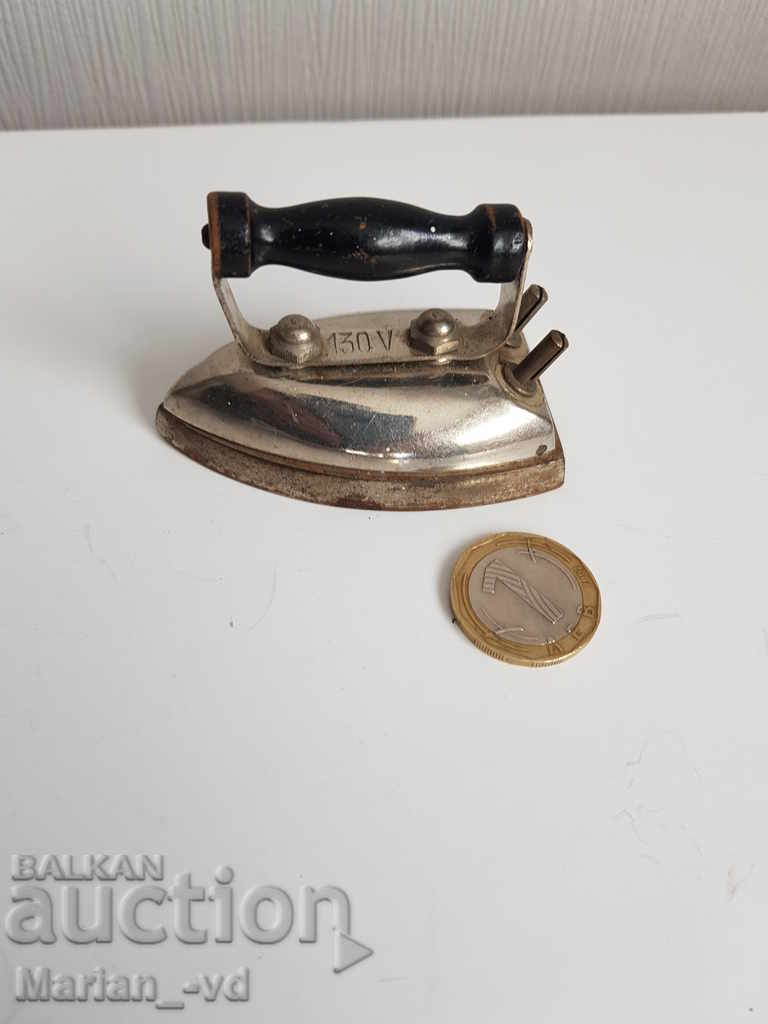 Miniature iron operating on 130 volts