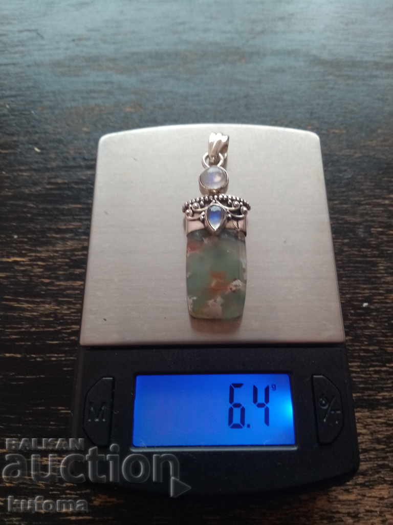 Silver pendant with natural stones