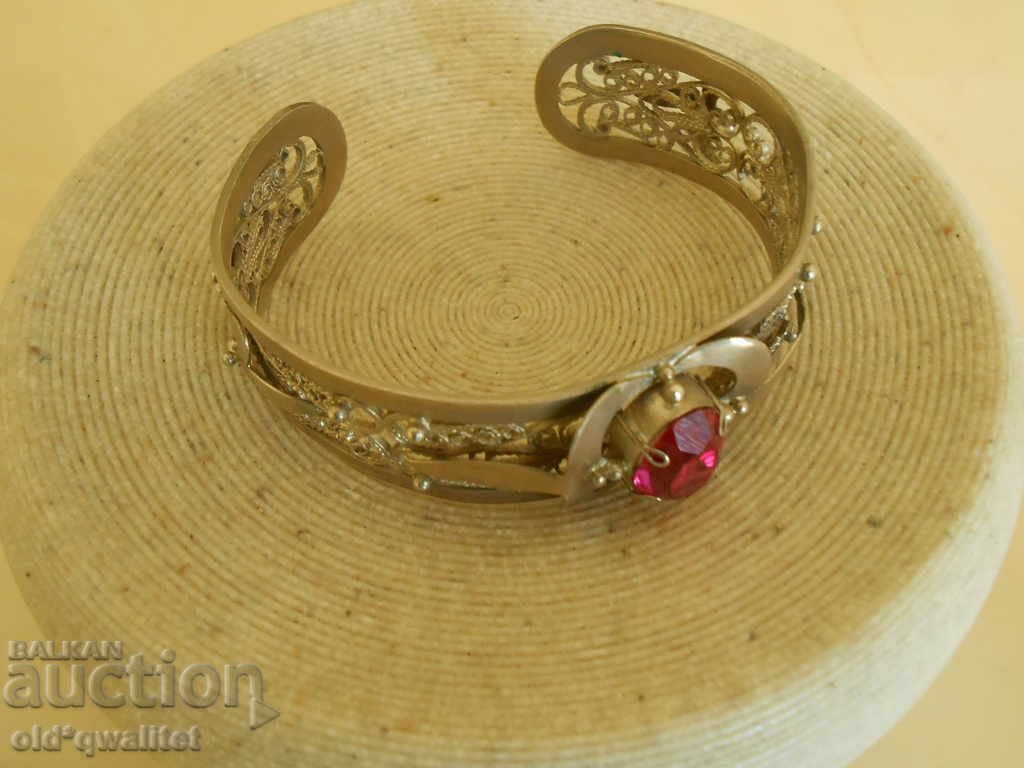 Unusual, old bracelet, filigree with a red accent with price 99.00 BGN | € 50.62