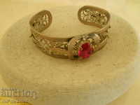 Unusual, old bracelet, filigree with a red accent