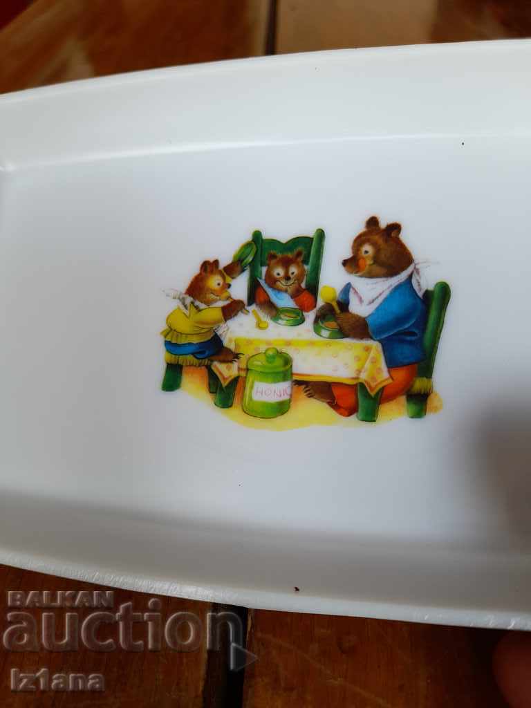 Auction  Old plastic plate, saucers