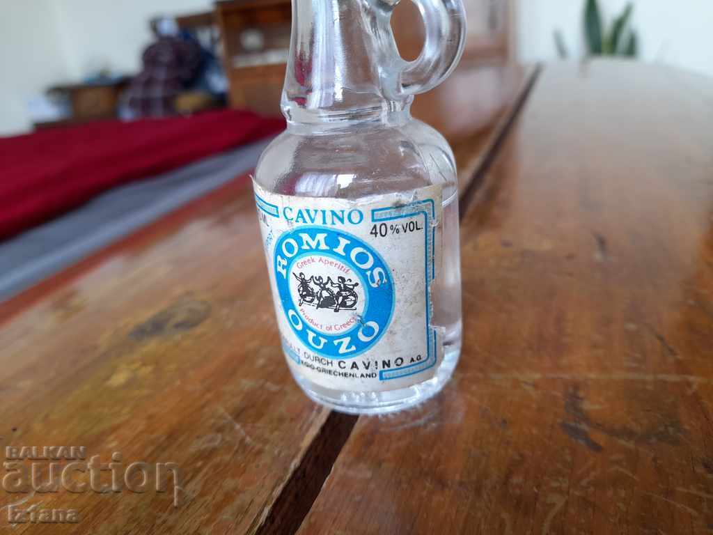 Auction Old bottle of Romios Ouzo Auction Old bottle of Romios Ouzo