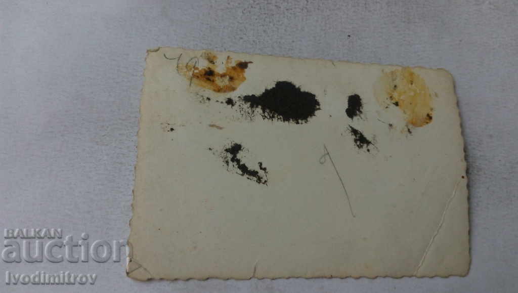 Photo Man next to a retro car with price 2.85 BGN | € 1.46 Photo Man next to a retro car with price 2.85 BGN | € 1.46