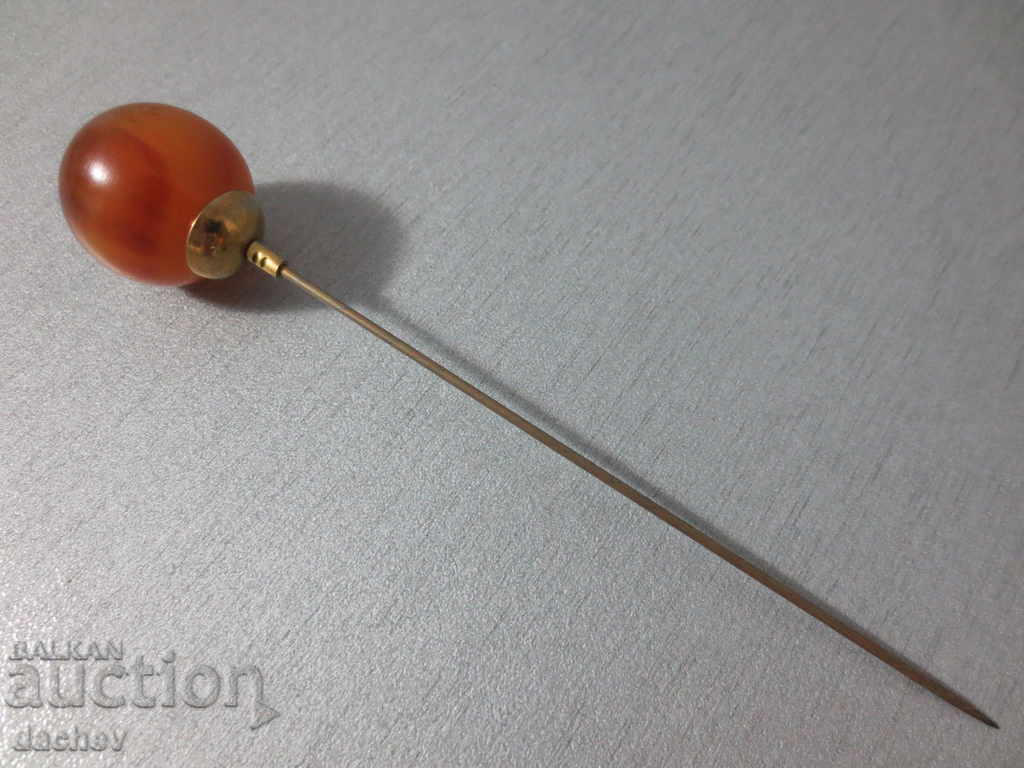 Auction A rare needle with a large amber ornament from the beginning of the 20th Century Auction A rare needle with a large amber ornament from the beginning of the 20th Century