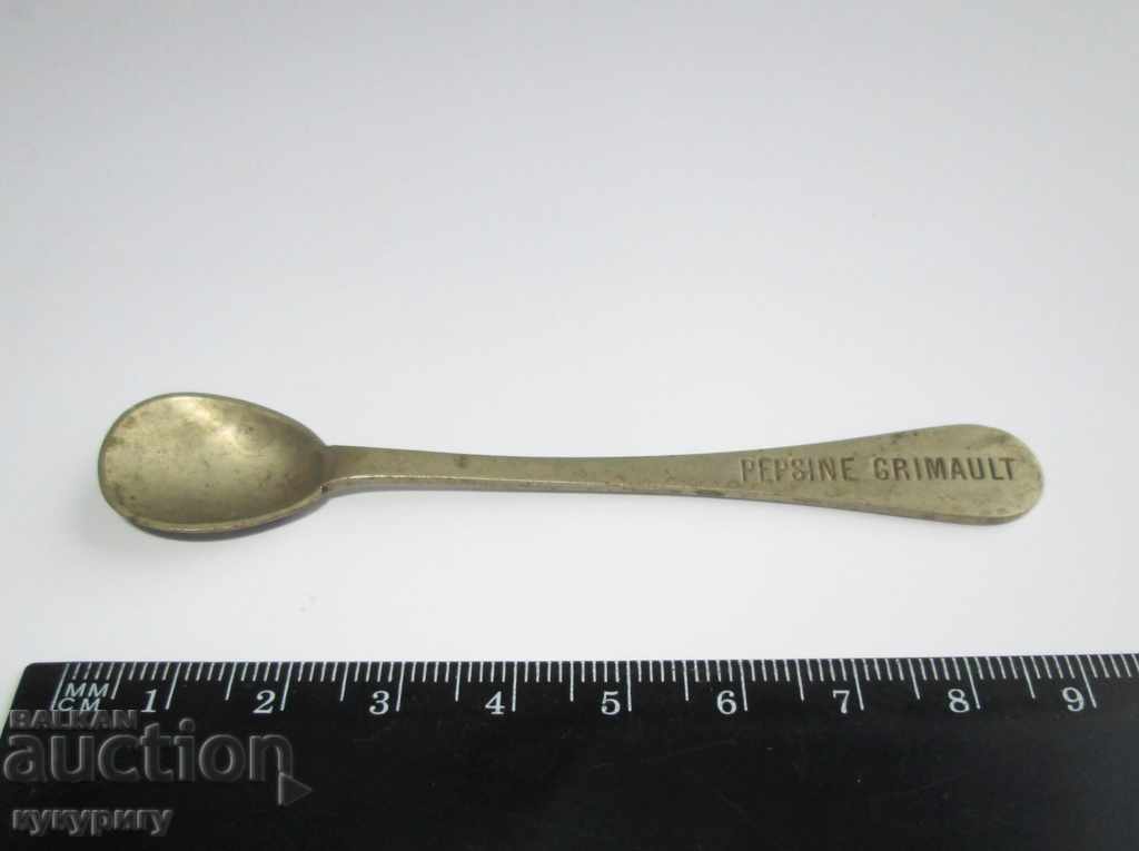 Delivery of Old antique French medical spoon advertising medicine
