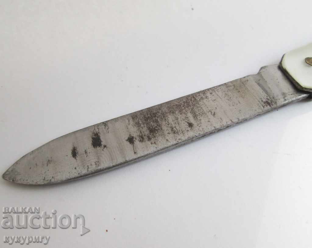 Auction Old pocket knife with rocket space keychain Auction Old pocket knife with rocket space keychain