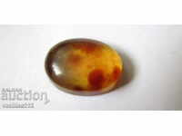 Amber, oval cabochon