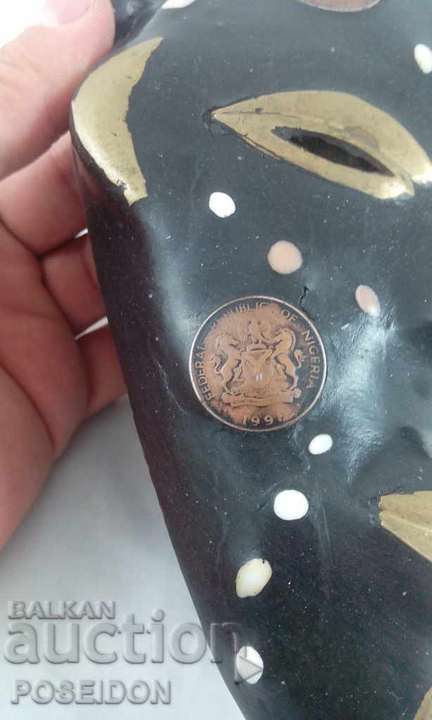 Delivery of TWO MASKS - MASKS ARE AUTHENTIC WITH COINS INSTALLED Delivery of TWO MASKS - MASKS ARE AUTHENTIC WITH COINS INSTALLED