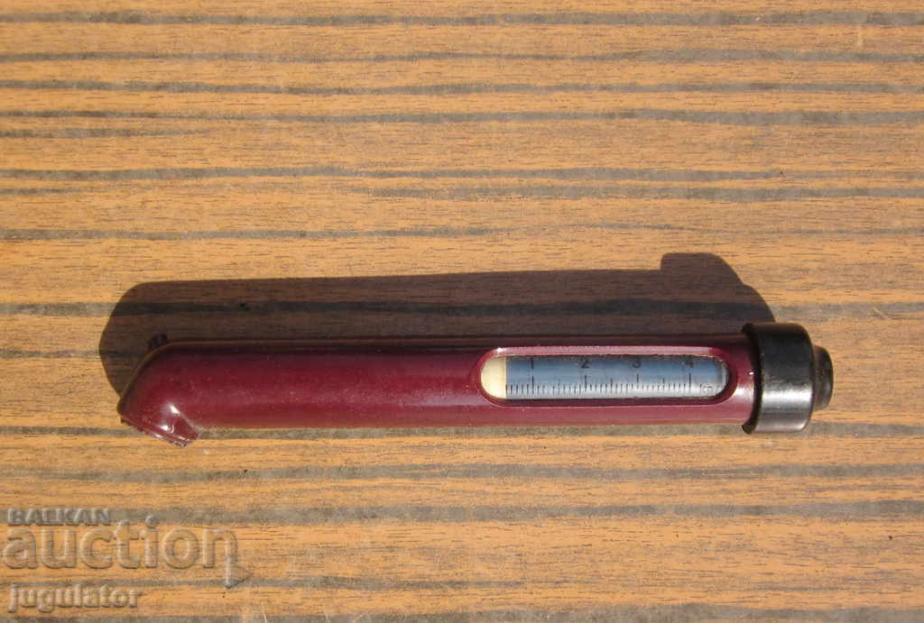 Auction BECAS German old tire pressure gauge on a vintage car Auction BECAS German old tire pressure gauge on a vintage car