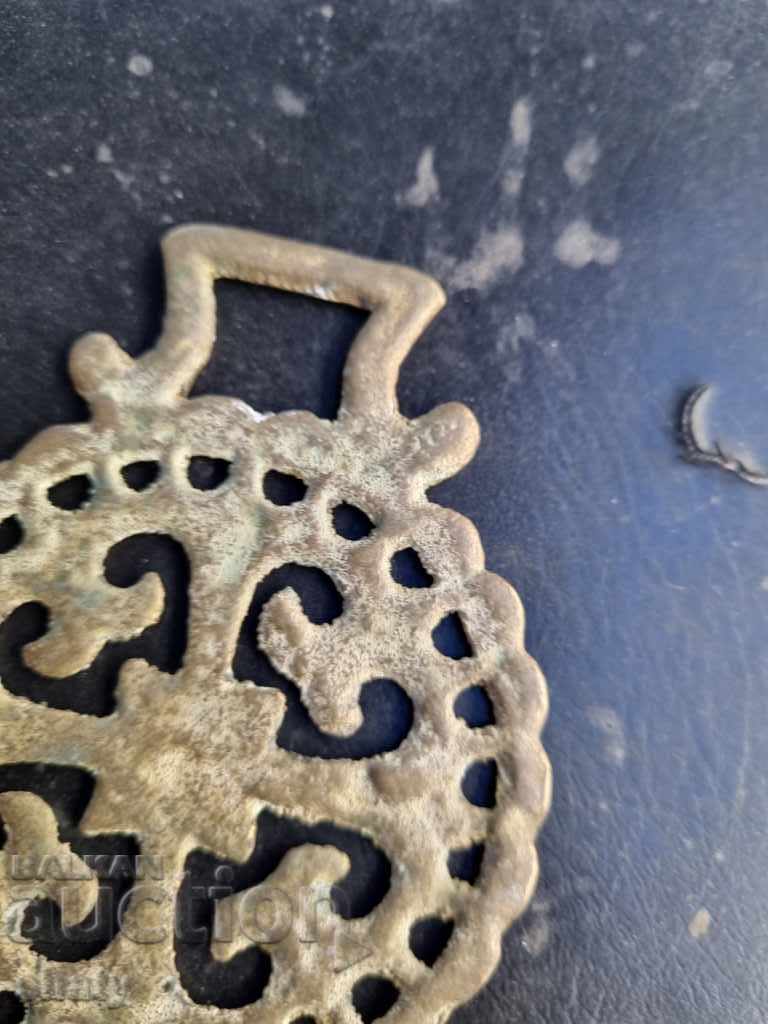 Delivery of Old bronze opener.