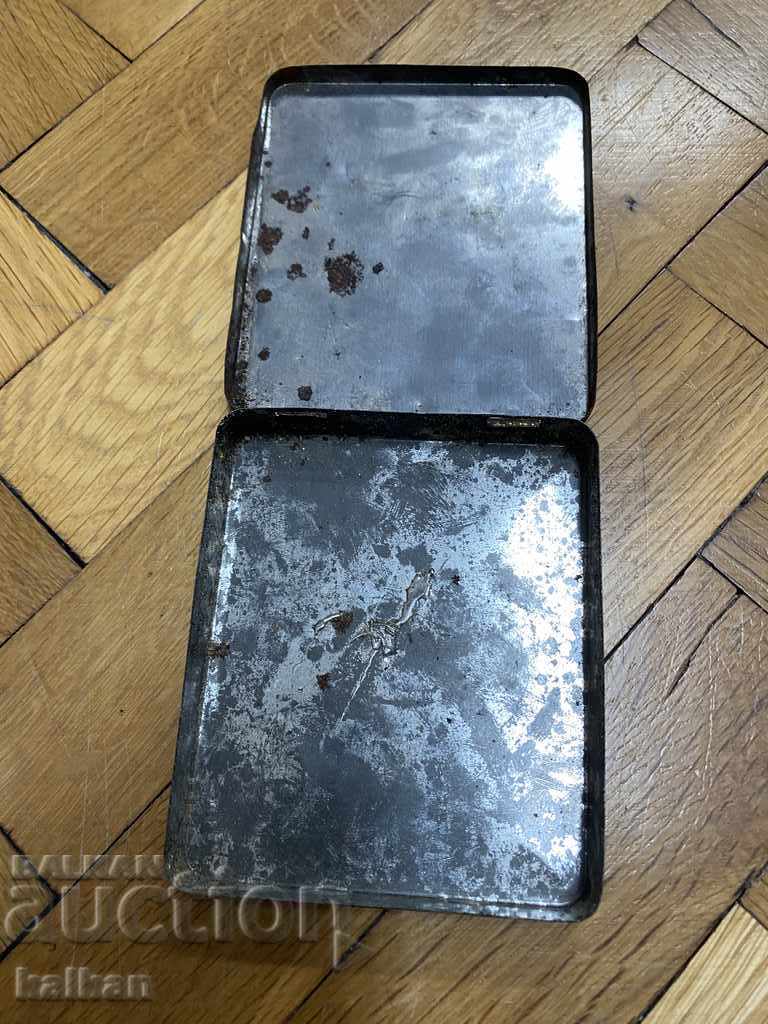 Delivery of Old metal box of cigarettes Delivery of Old metal box of cigarettes