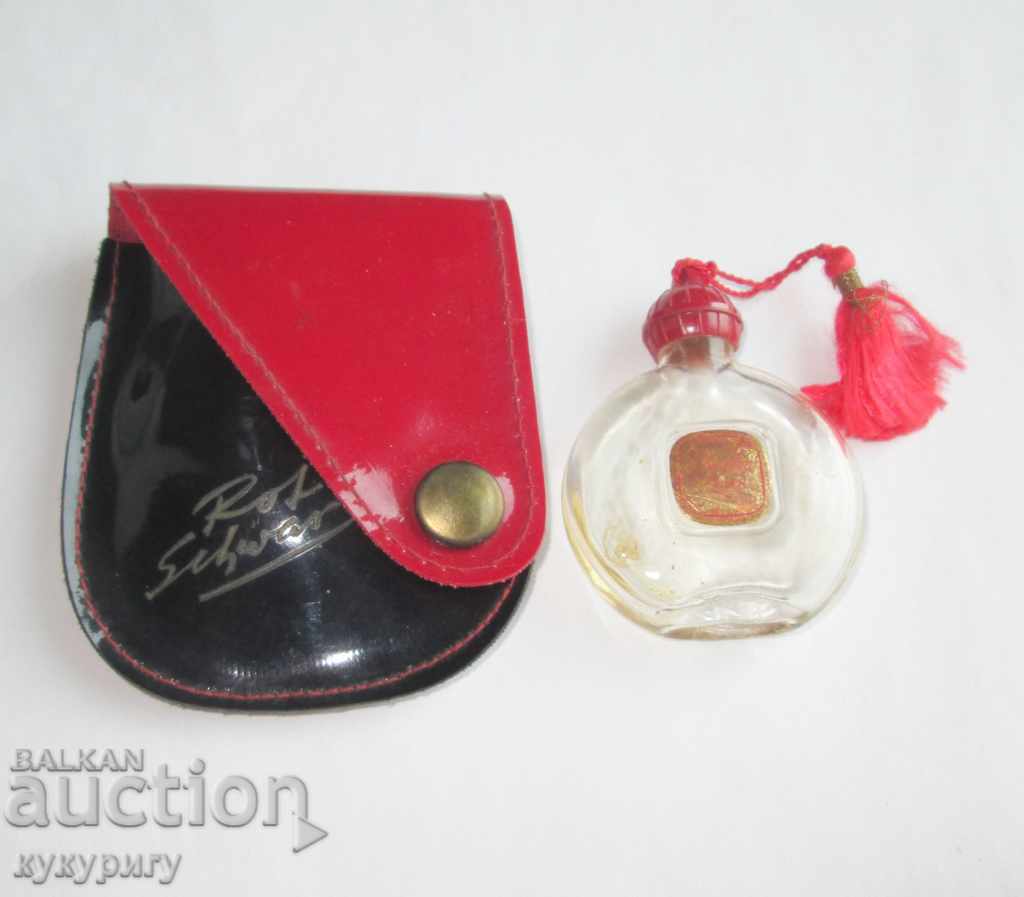 Old French bottle of Moulin Rouge perfume bottle