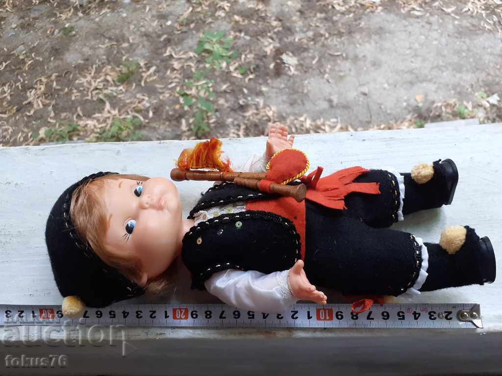 Old rubber doll in a bagpipe costume - - 6 Old rubber doll in a bagpipe costume - - 6