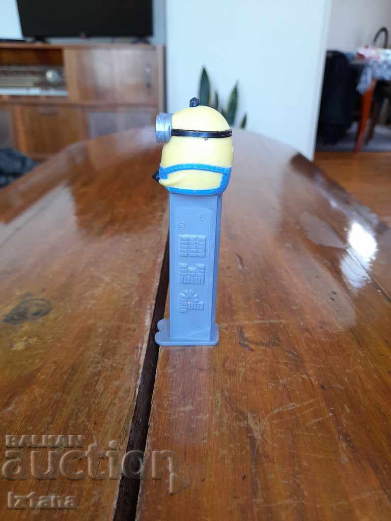 Livrarea O cutie de bomboane PEZ Livrarea O cutie de bomboane PEZ