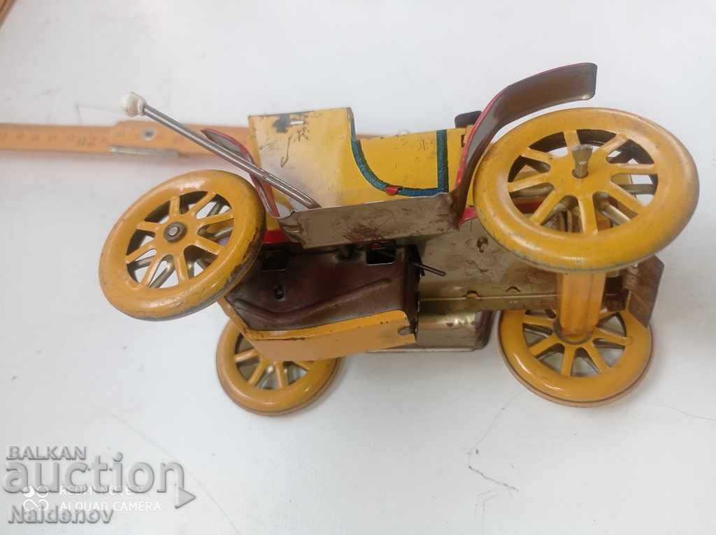 Аукцион Ламаринена играчка механична автомобил Аукцион Ламаринена играчка механична автомобил