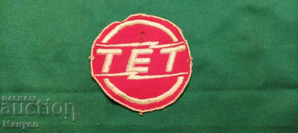 I am selling an old textile emblem