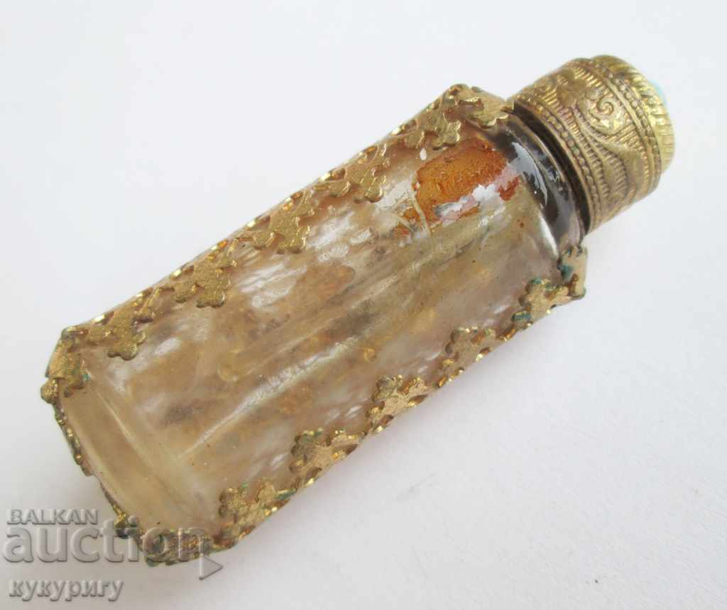 Old antique perfume bottle with gilded ornaments with price 40.00 BGN | € 20.45